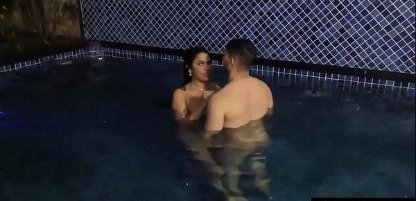  Voluptuous Shemale Sabrina Sousa and a Guy Make Out in a Swimming Pool